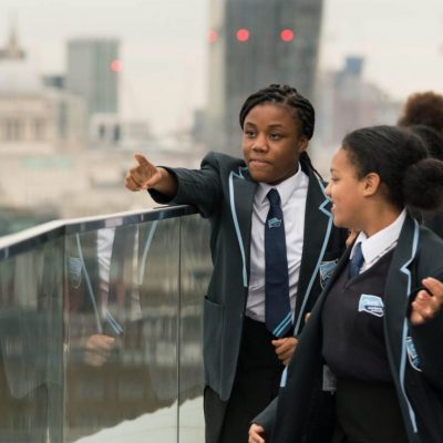 London skyline and young people