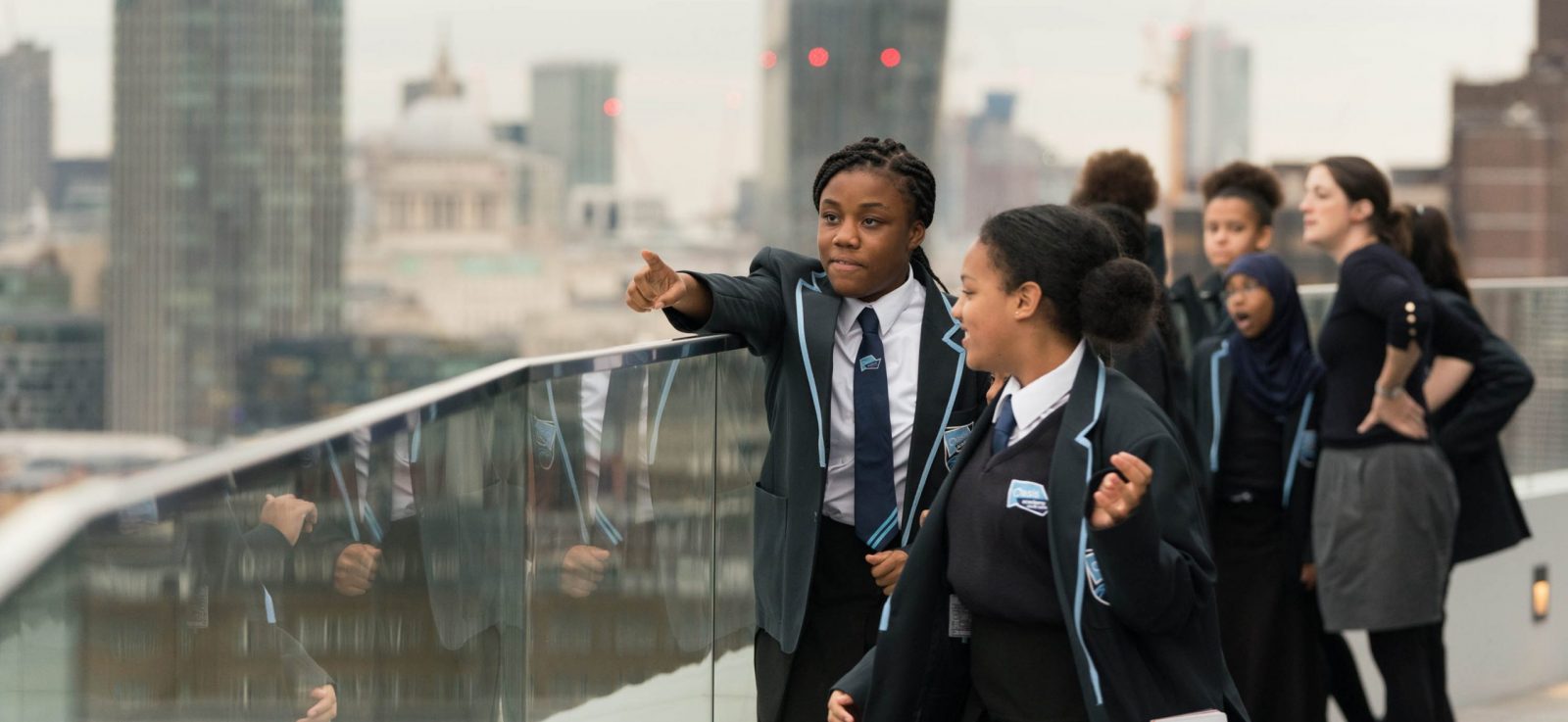 London skyline and young people